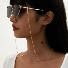 Cadena de perlas para gafas en dorado, elegante y funcional, ideal para mantener tus gafas siempre a la mano