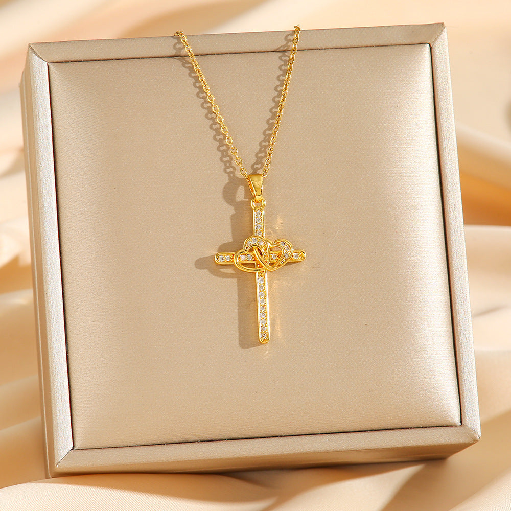 Collar de amor y elegancia en oro con diseño de cruz y corazón, perfecto para ocasiones especiales