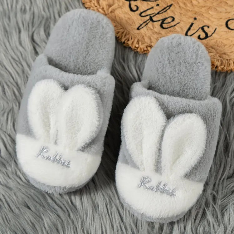 Pantuflas orejas de conejo grises con suave tejido y diseño divertido para uso en casa