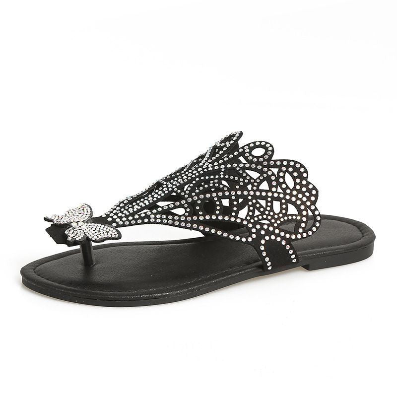 Sandalias con brillantes en negro con diseño elegante de mariposa para un look veraniego