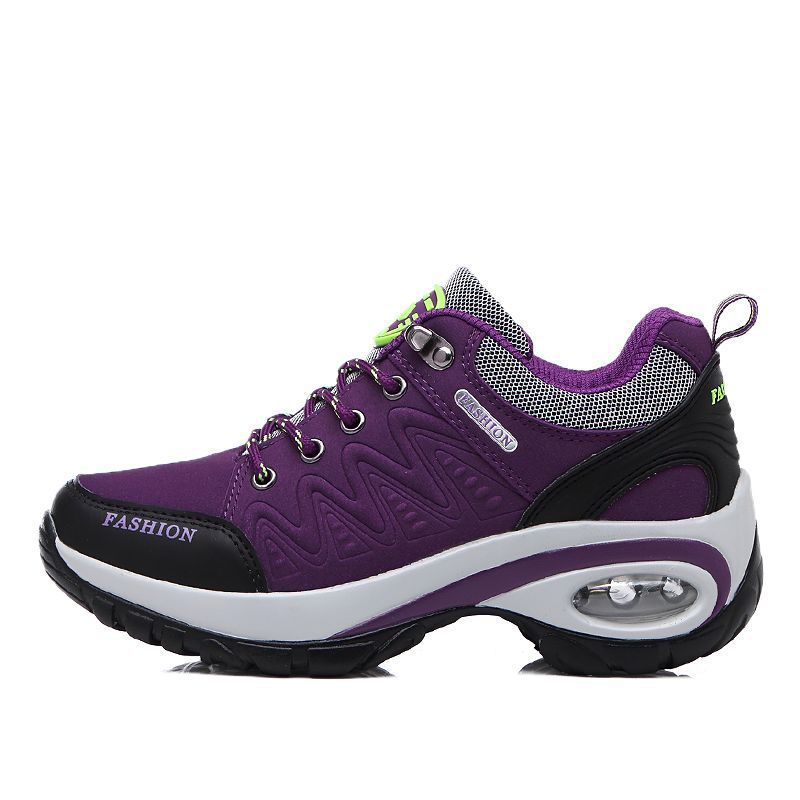 Zapatillas de running para mujer en púrpura con diseño moderno y suela amortiguadora