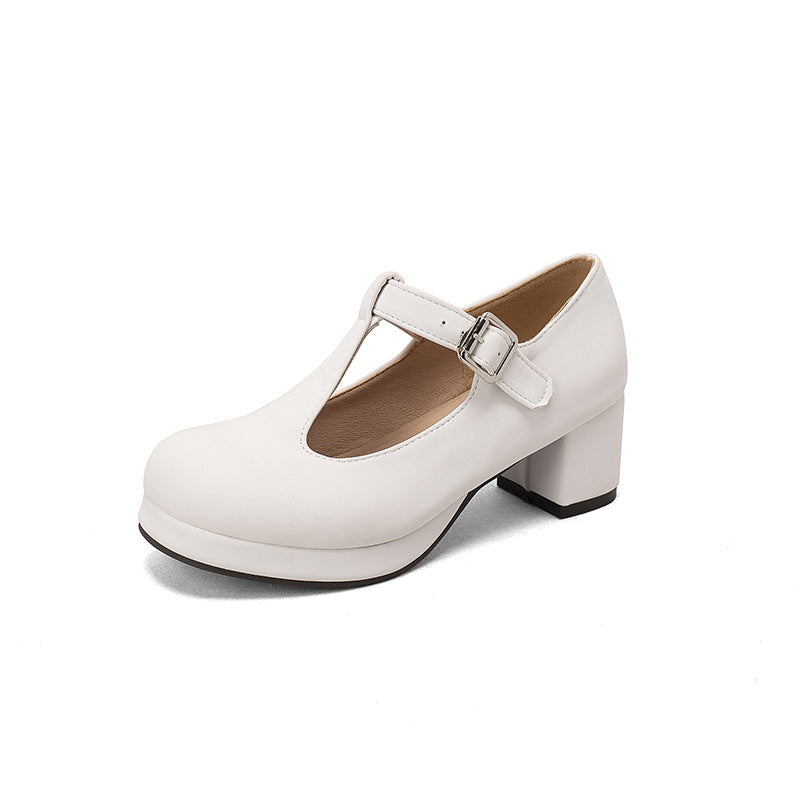 Zapatos T-strap moda en blanco con tacón bajo y cierre de hebilla para un estilo elegante