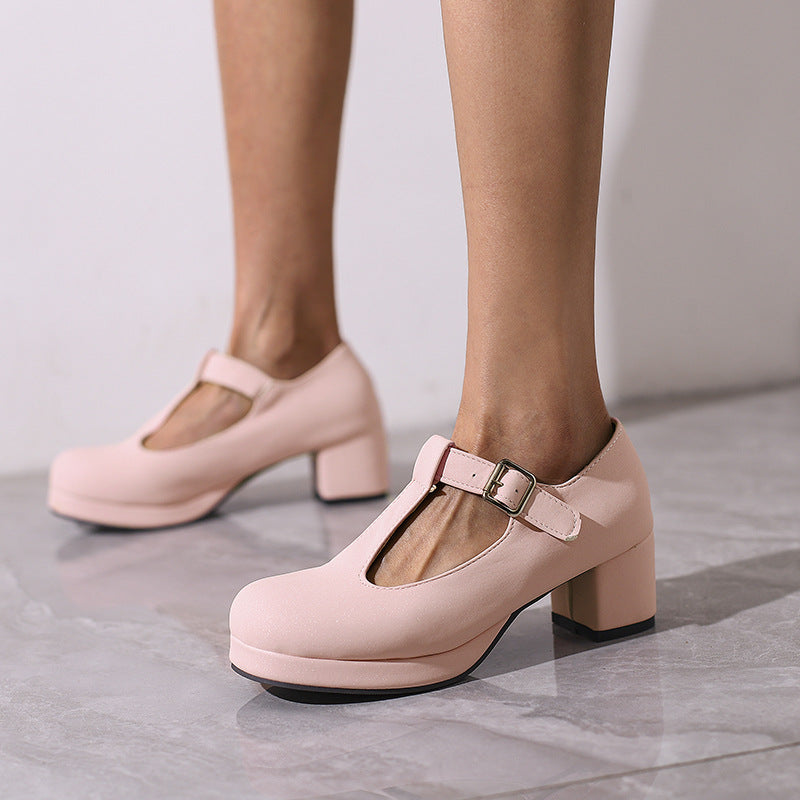 Zapatos T-strap moda en rosa con tacón bajo y diseño elegante para ocasiones especiales.